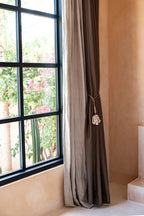 The Door Shell Cowrie Tassel - Natural