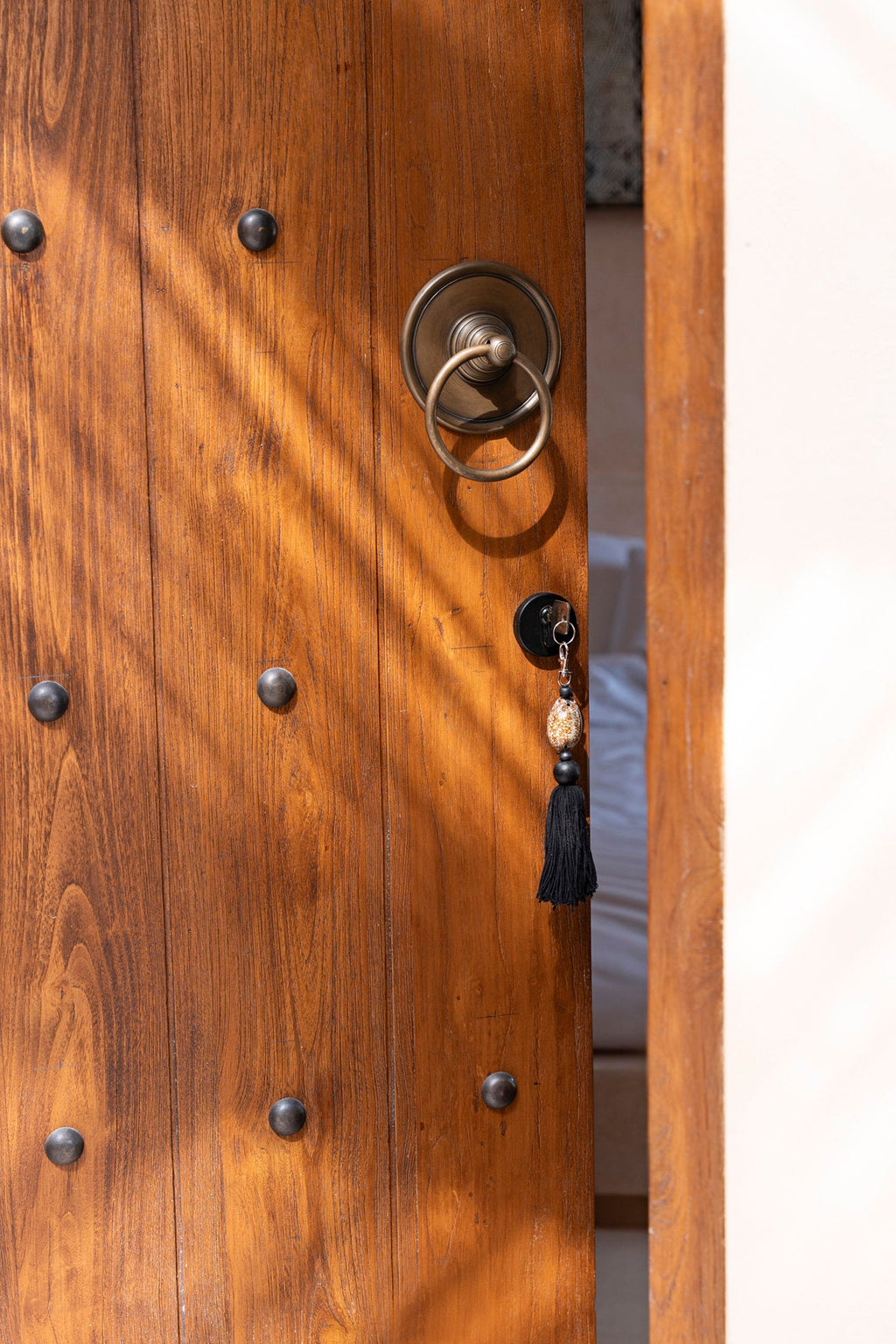 Llavero Sumbawa - negro y marrón