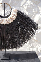 The Alang Cowrie on Stand