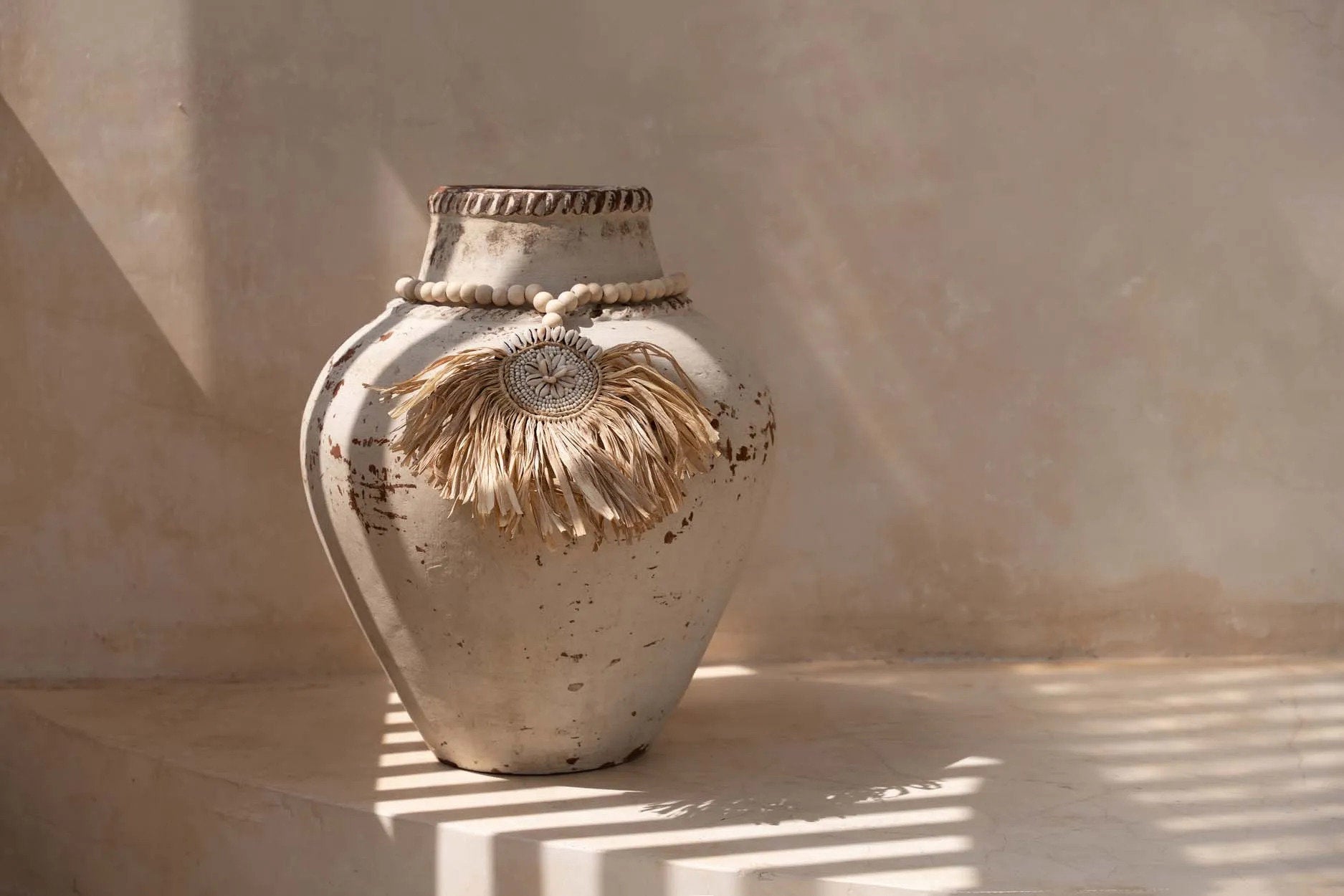 La borla Tajoe de rafia - natural