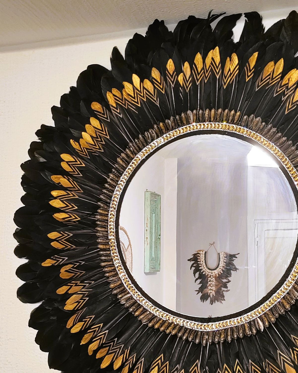 Espejo de plumas “Eclipse Dorado”