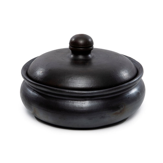 La olla de curry quemada - negra